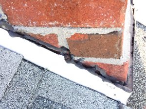 roof leaks in chimney flashing