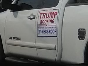 trump roofing sign