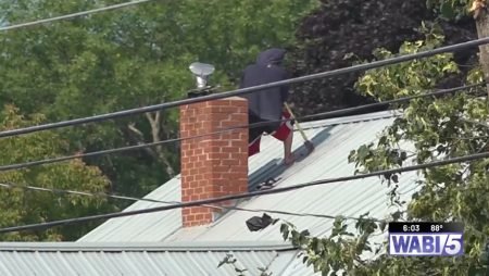 Man Chops Holes In Roof With Axe in Bangor bangor roof axe